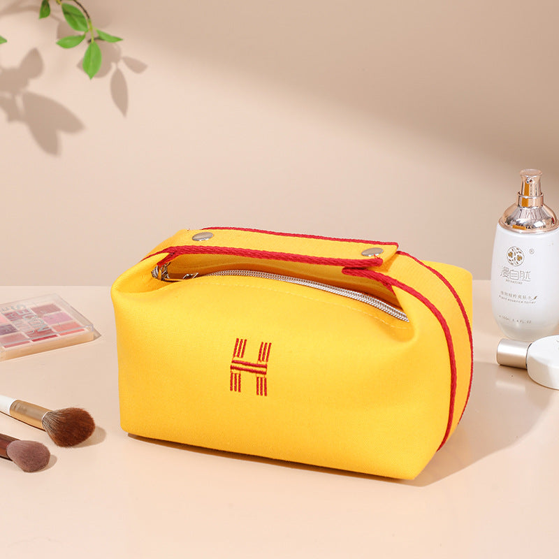 Portable premium canvas makeup bag, large capacity, washable, stylish storage for women