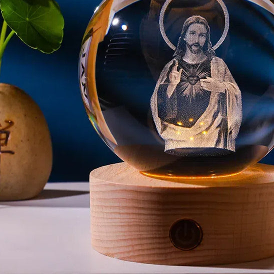 Luminous crystal ball with carved Jesus solid wood base for home decoration