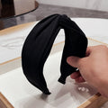 Fashionable fabric cross bow headband