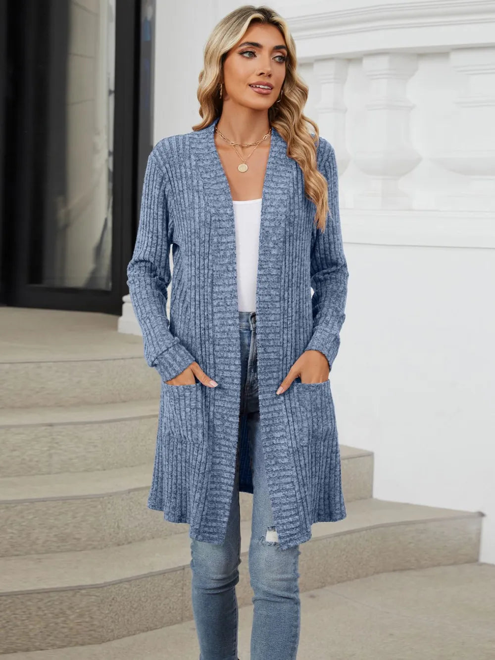 Autumn and winter long color long sleeved loose pocket cardigan jacket for women